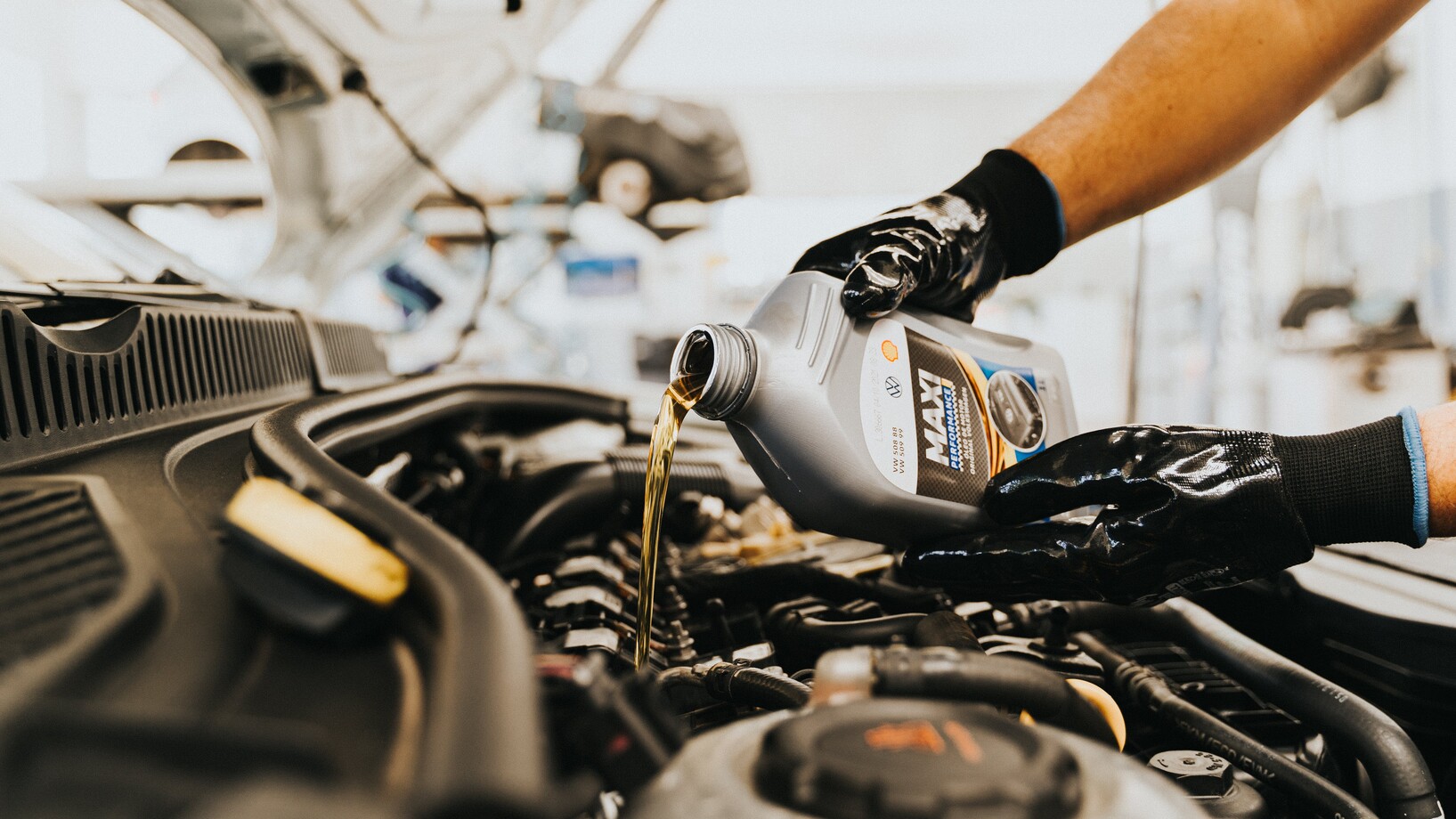 Pouring oil to engine