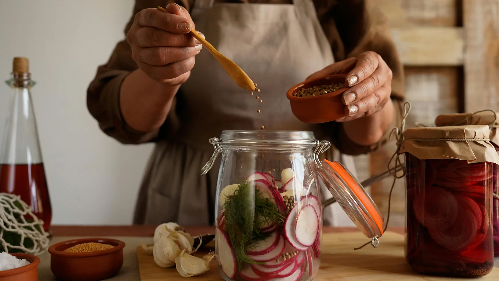 Preparing homemade pickled vegetables in jar