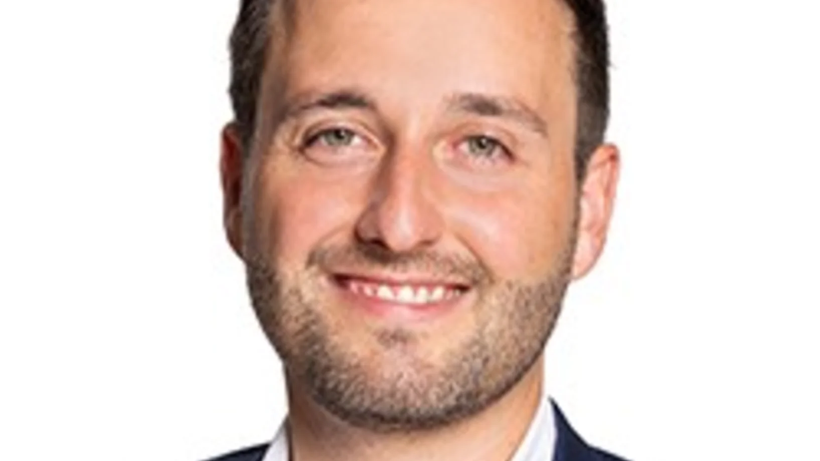 Marco Baumann in blauem Kittel und weissem Hemd